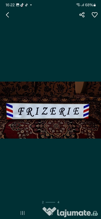 Firma luminoasa "Frizerie"