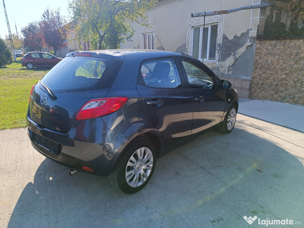 Mazda 2 an 2008 benzina 1.3 klima distribuție lanț