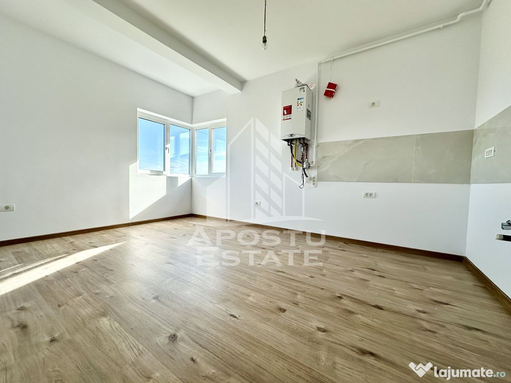 Apartament cu 3 camere, 2 balcoane, parcare acoperita, zo...