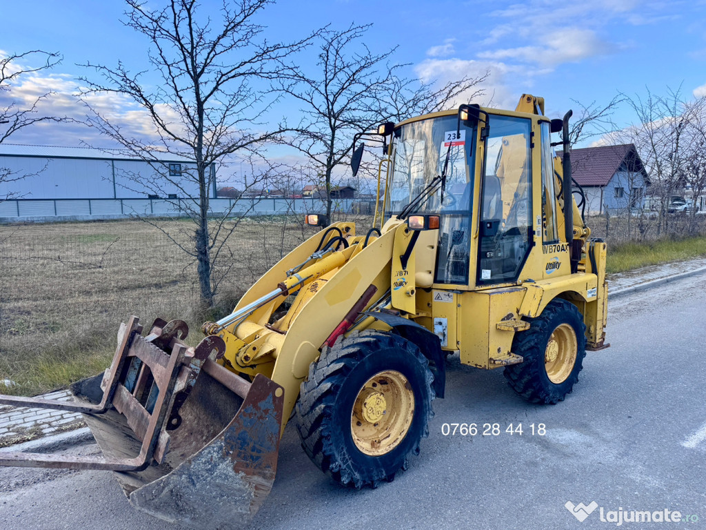 Buldoexcavator KOMATSU WB70A