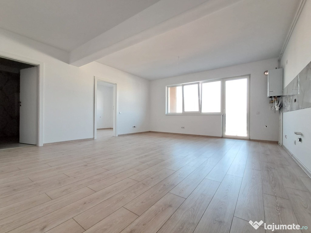 Apartament 2 camere FINISAT, et.1,balcon 7 mp Floresti