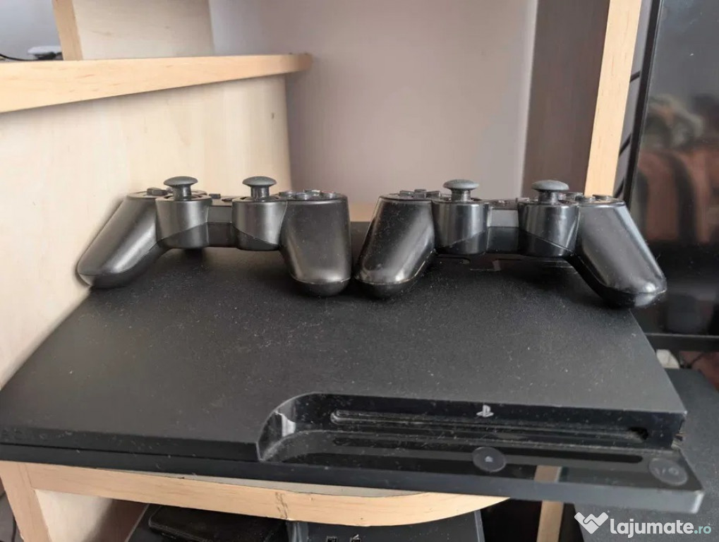 Play station 3 slim (ps3) cu 5 jocuri si 2 joystick-uri