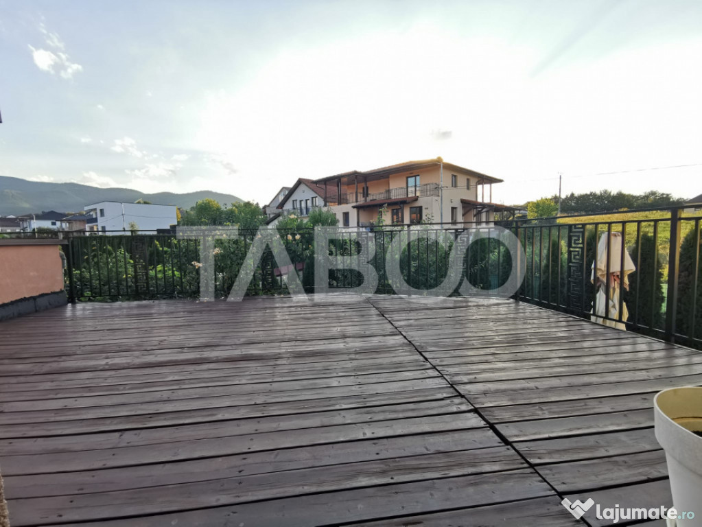 Casa de vanzare cu 4 camere decomandate si garaj in Cisnadie