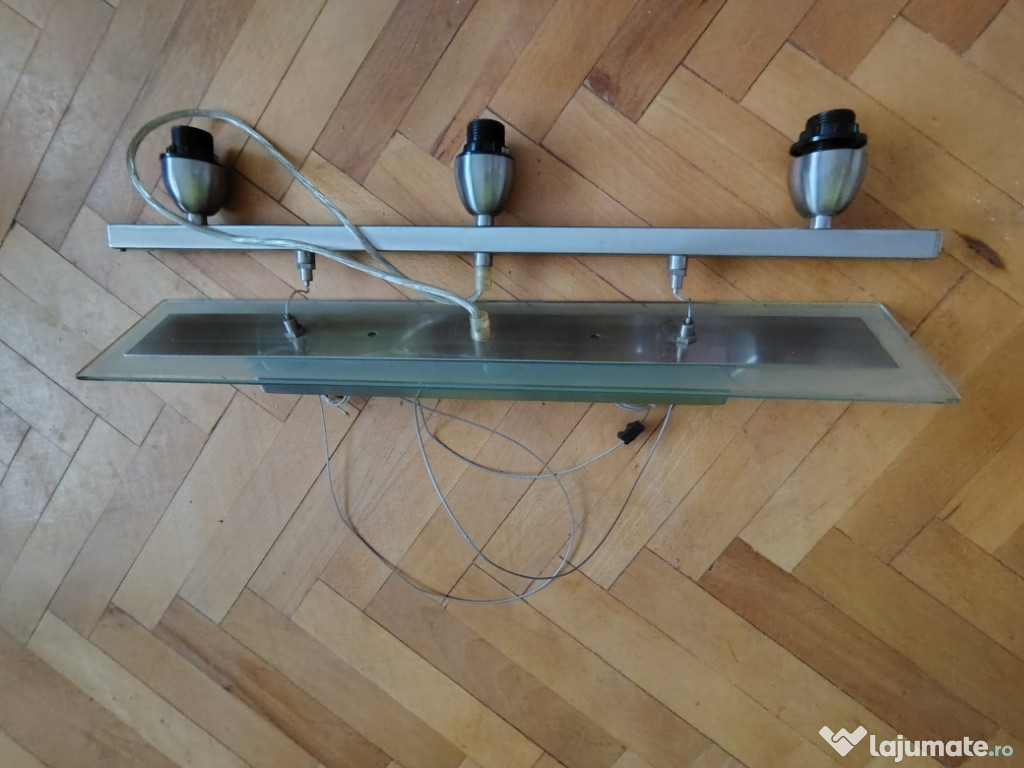 Corp de iluminat din inox și sticlă