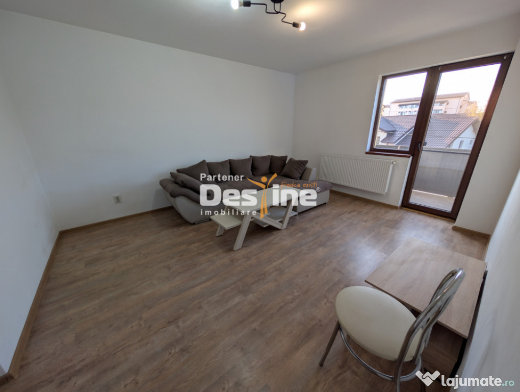 Apartament decomandat cu 2 camere mobilat si loc de parcare