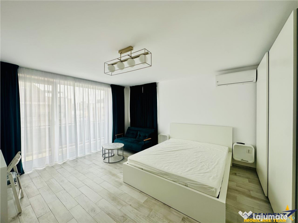 Decomandat cu loc de parcare, etaj intermediar, doua balcoan