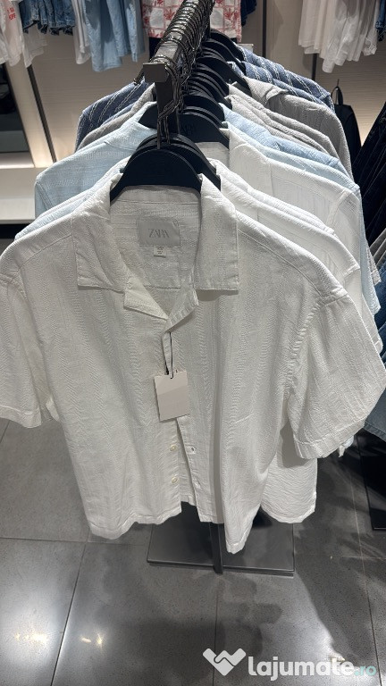 Vând cămașa aproape nouă