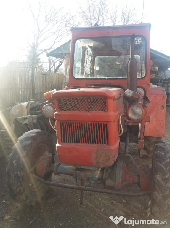 Tractor + Cultivator + plug + disc purtat
