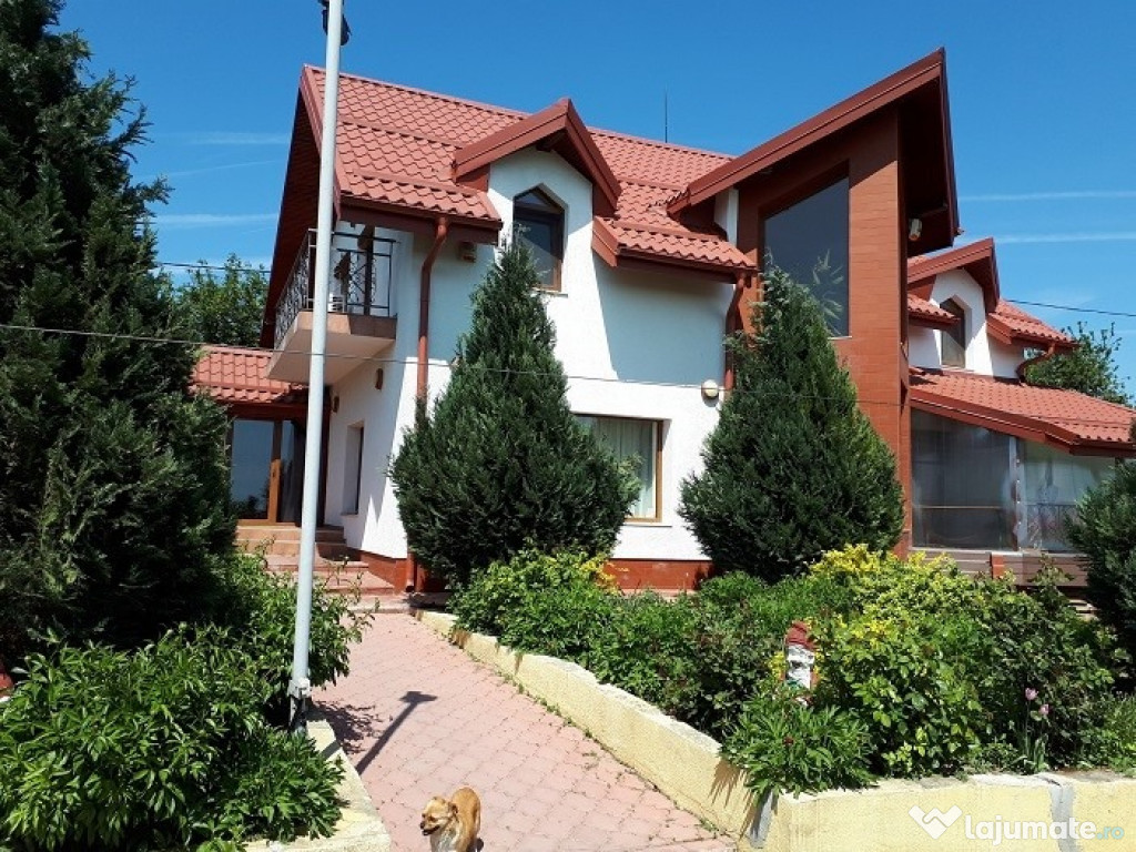 Casa pentru doua familii curte 1167 mp la 20 km de Bucuresti