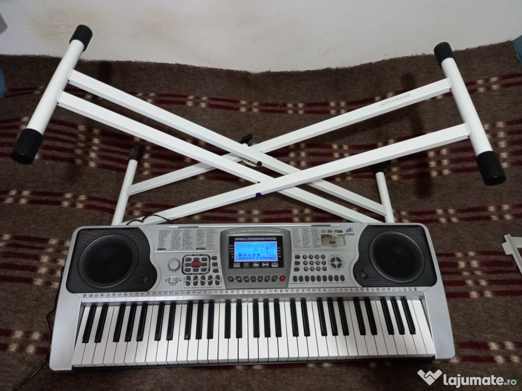 Vând orgă și stativ în stare foarte bună