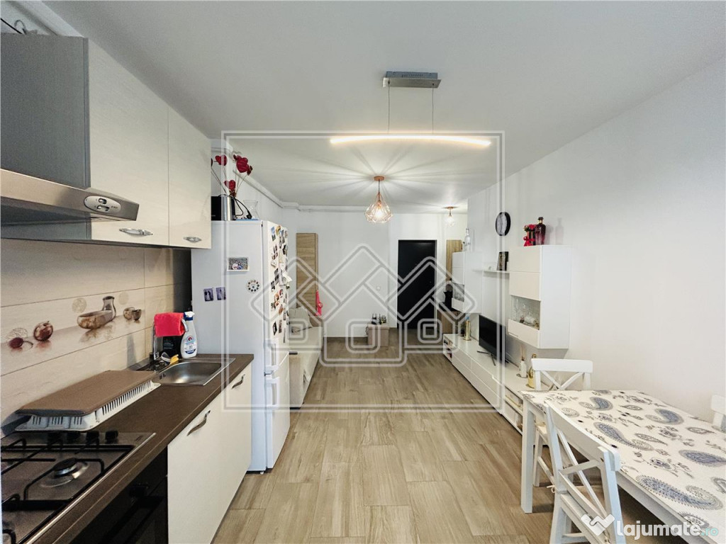 Ap cu 2 camere, balcon, boxa si loc de parcare, etaj 2/4 - T