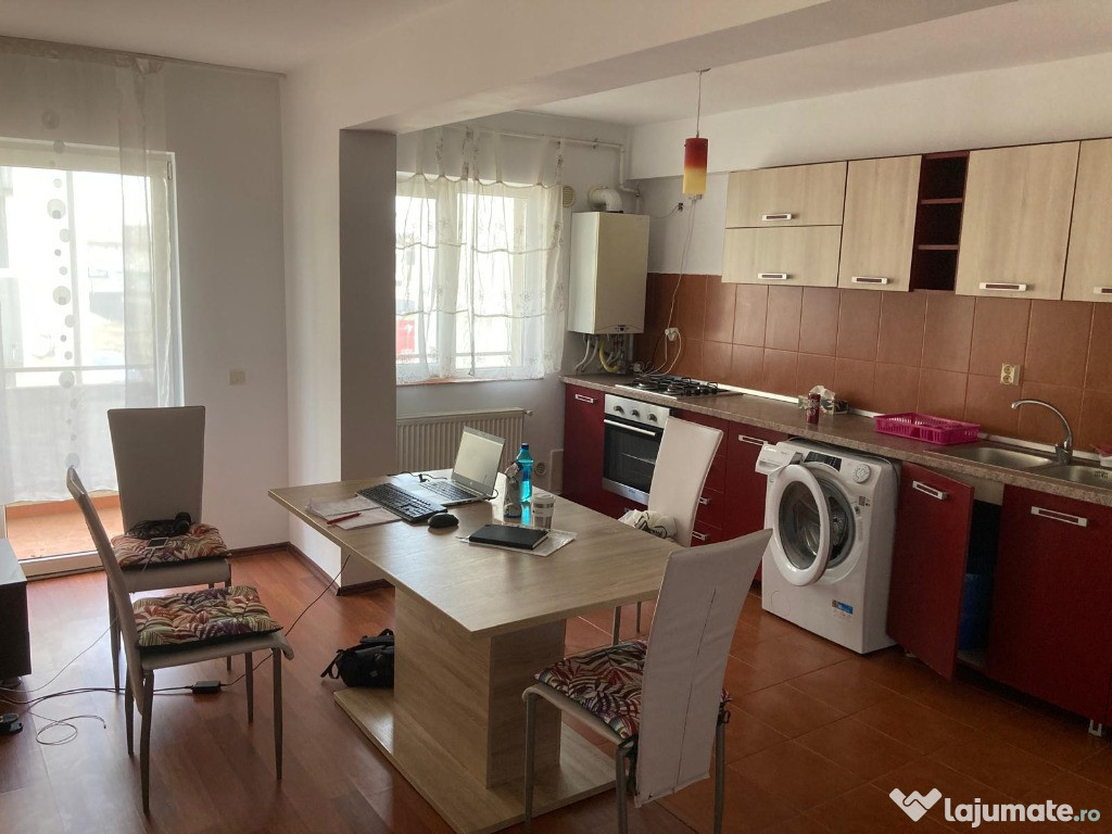 Apartament 2 camere 52 mp,etaj 1 din 3,parcare zona Terra Floresti