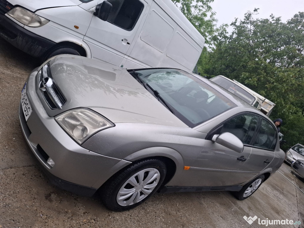 Opel vectra c 1.6i an 2005 1300e