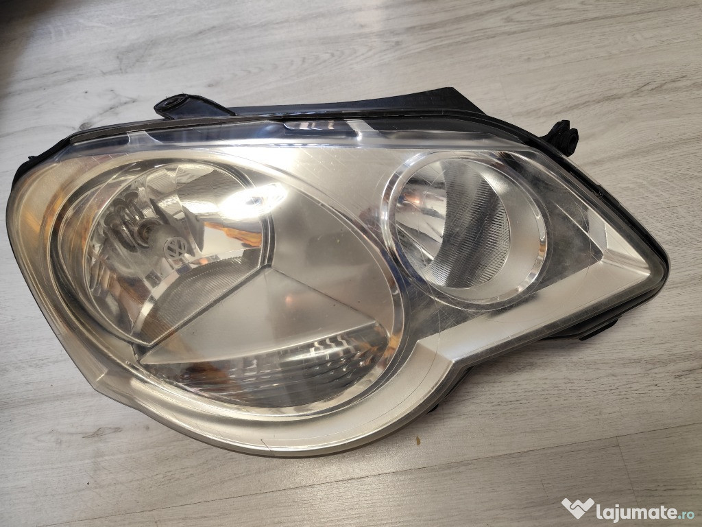 Faruri Hella pentru VW POLO 2008