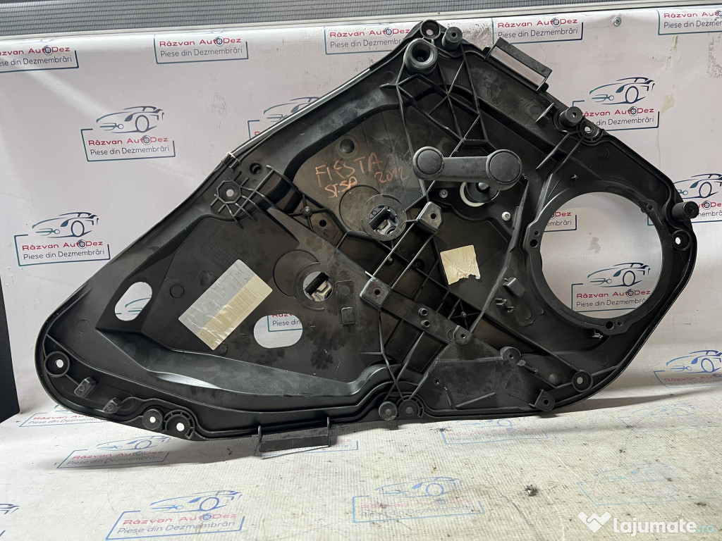 Macara geam stanga spate Ford Fiesta 2012
