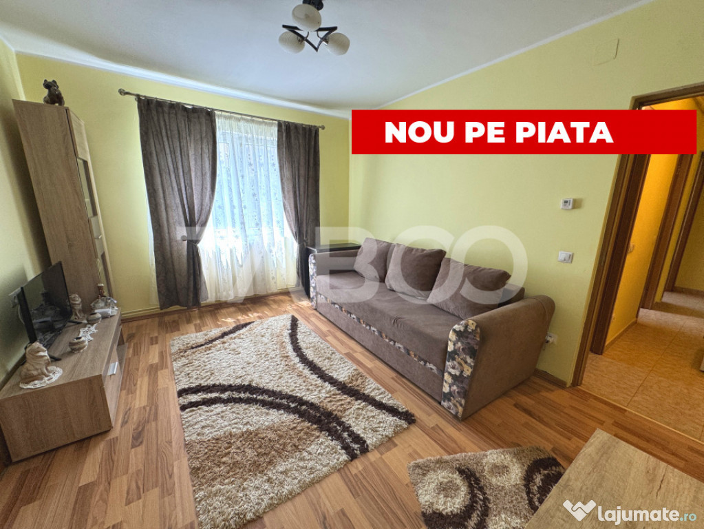 Apartament renovat de vanzare cu 3 camere etaj 1 zona Rahove