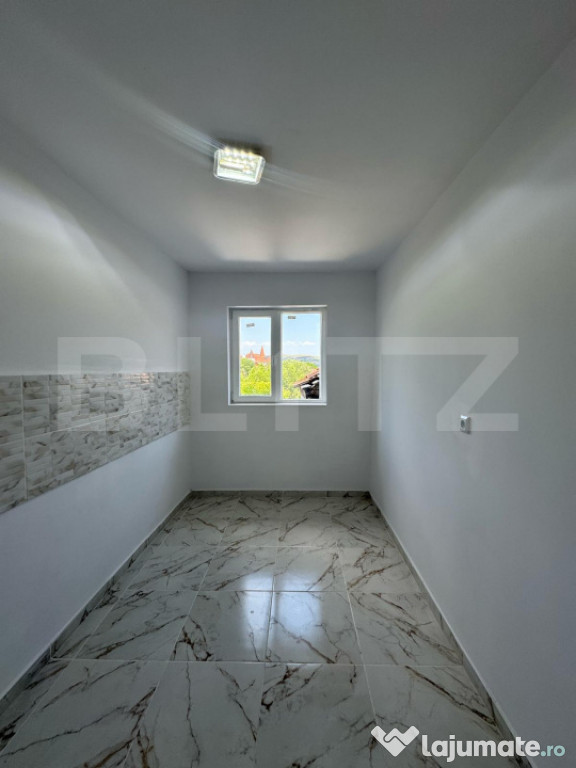 Casa cu 2 camere si cu o superba priveliste spre Castelul Co