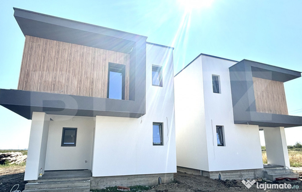 Casă individuală cu design modern și curte proprie – co