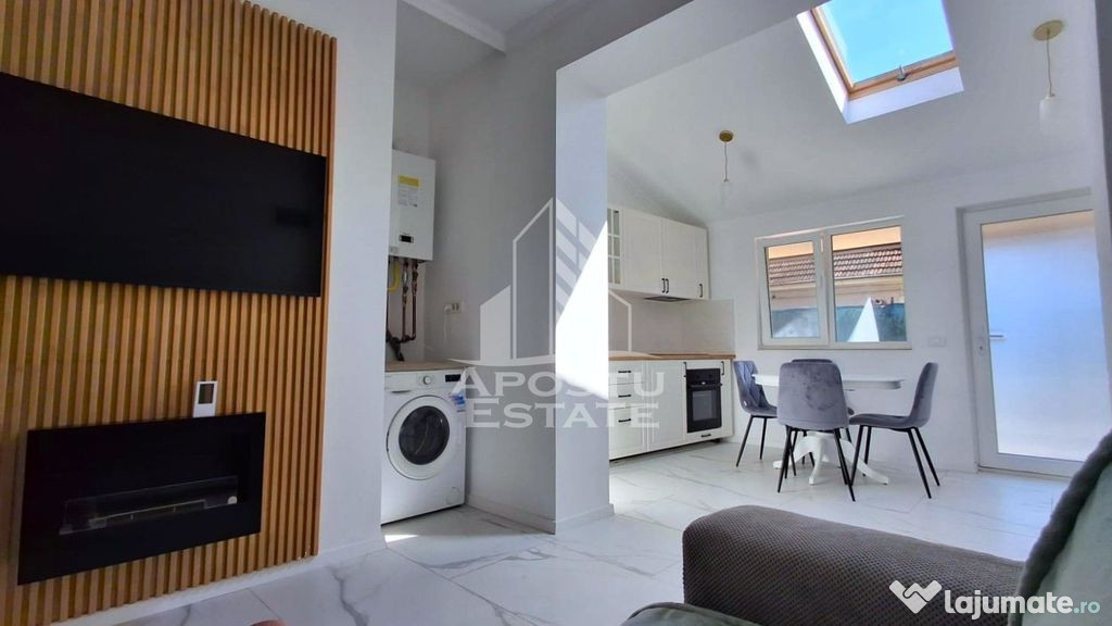 Apartament la curte comuna 2 camere,terasa si boxa