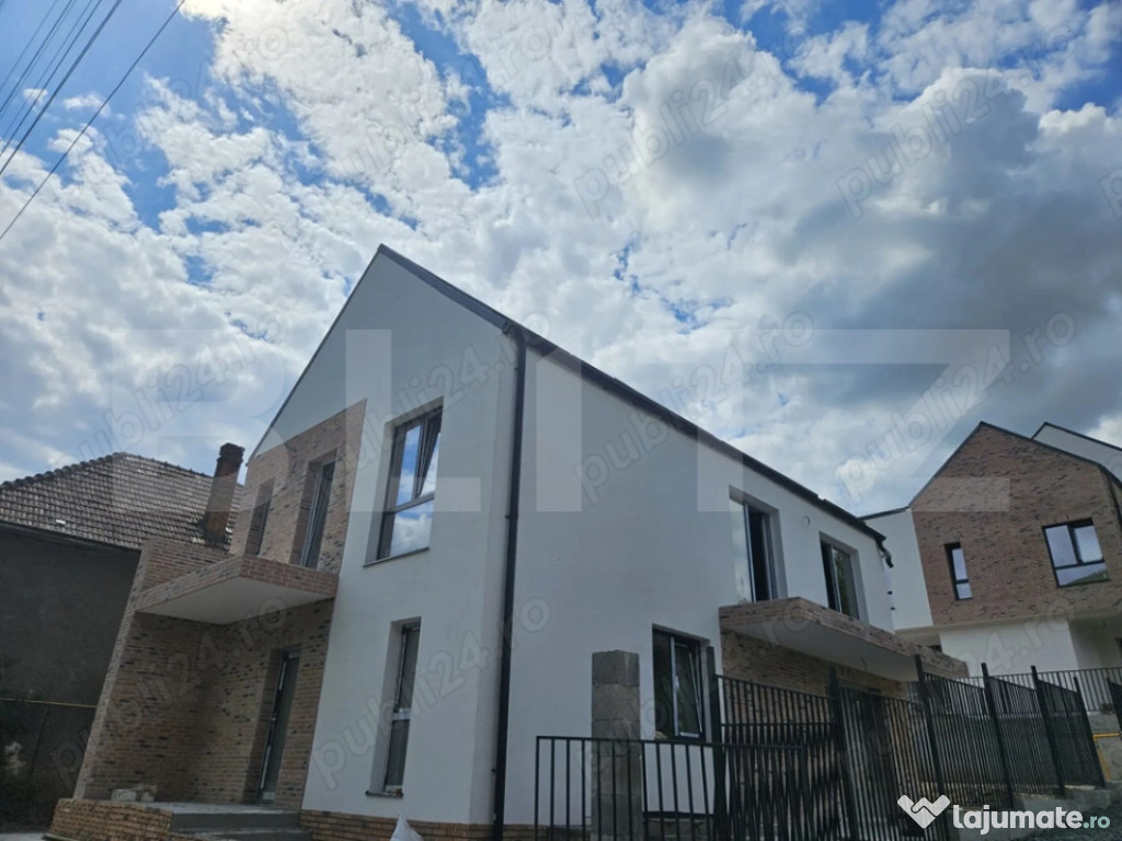 Casa luminoasa 120mp cu living generos, materiale premium si