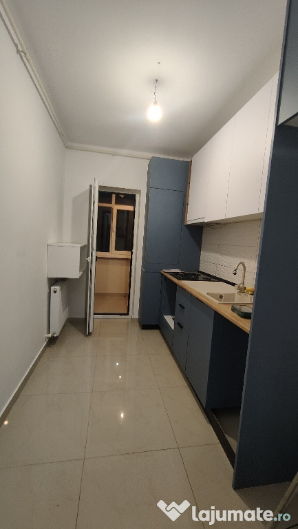 Apartament cu 2 camere si loc de parcare central