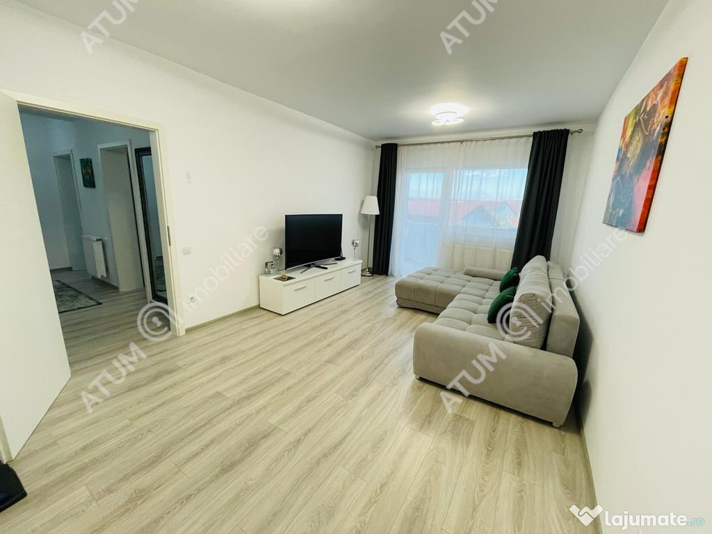 Apartament cu 2 camere decomandate si balcon etaj intermedia