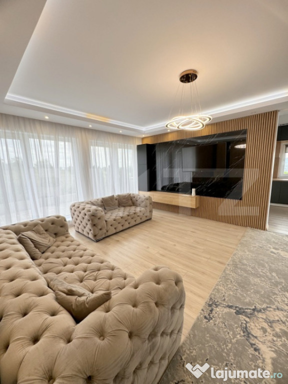 Casa INDIVIDUALA , 2 locuri de parcare , gradina amenajata ,