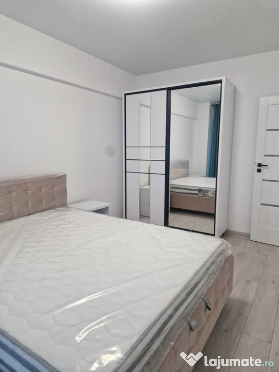 De inchiriat , apartament cu 2 camere , loc de parcare , Con