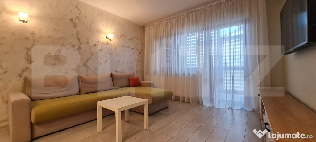 Apartament complet amenajat-2 camere, decomandat, curte priv