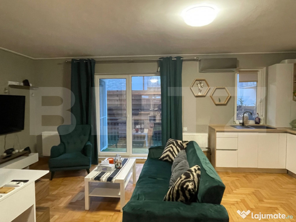 Apartament semidecomandat cu 3 camere, gradina de 80 mp, par