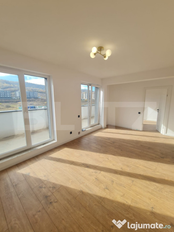 Apartament finisat, 52 mp utili, terasa 34 mp, bucatarie inc