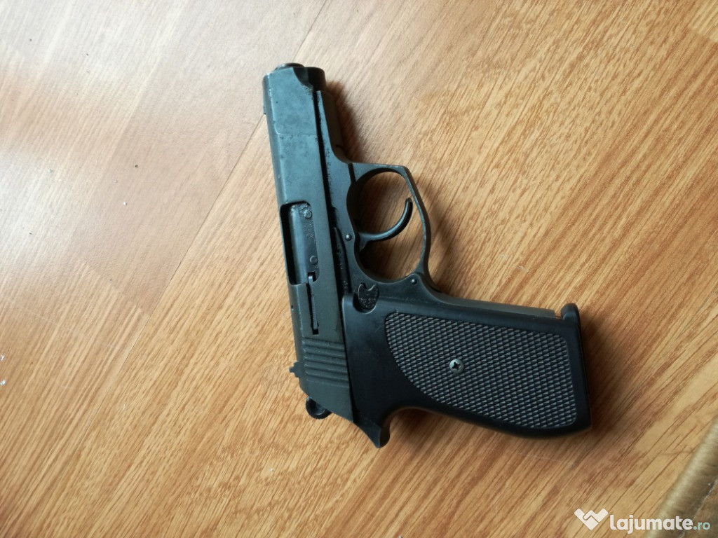 Pistol cu bila de cauciuc autoaparare