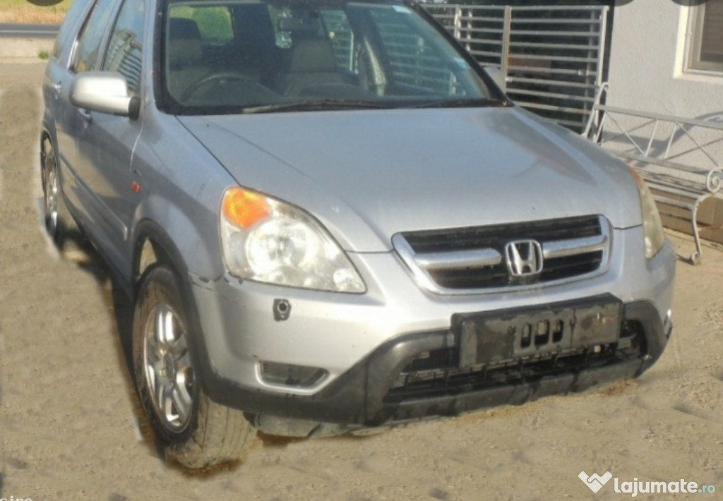 Dezmembrez honda cr v 2 2.2 2006