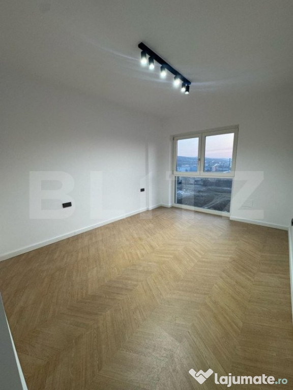 Apartament 2 camere cu terasa si parcare subterana intr-un b