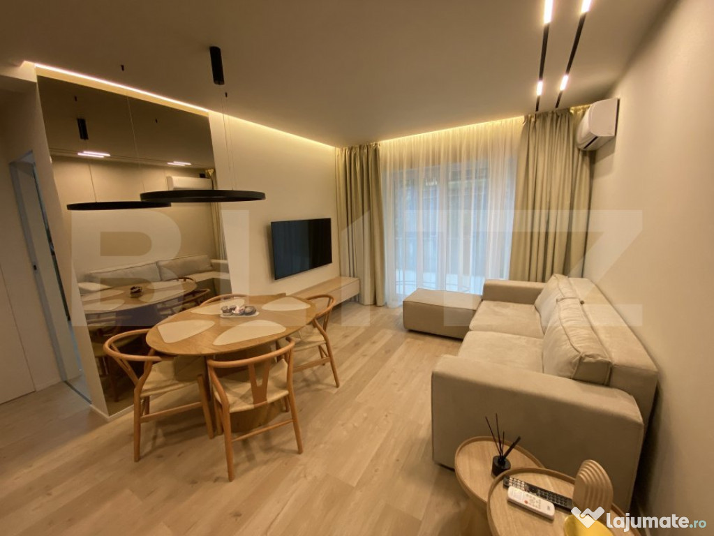 Apartament cu doua camere, 50 mp, ultrafinisat, zona Coada L