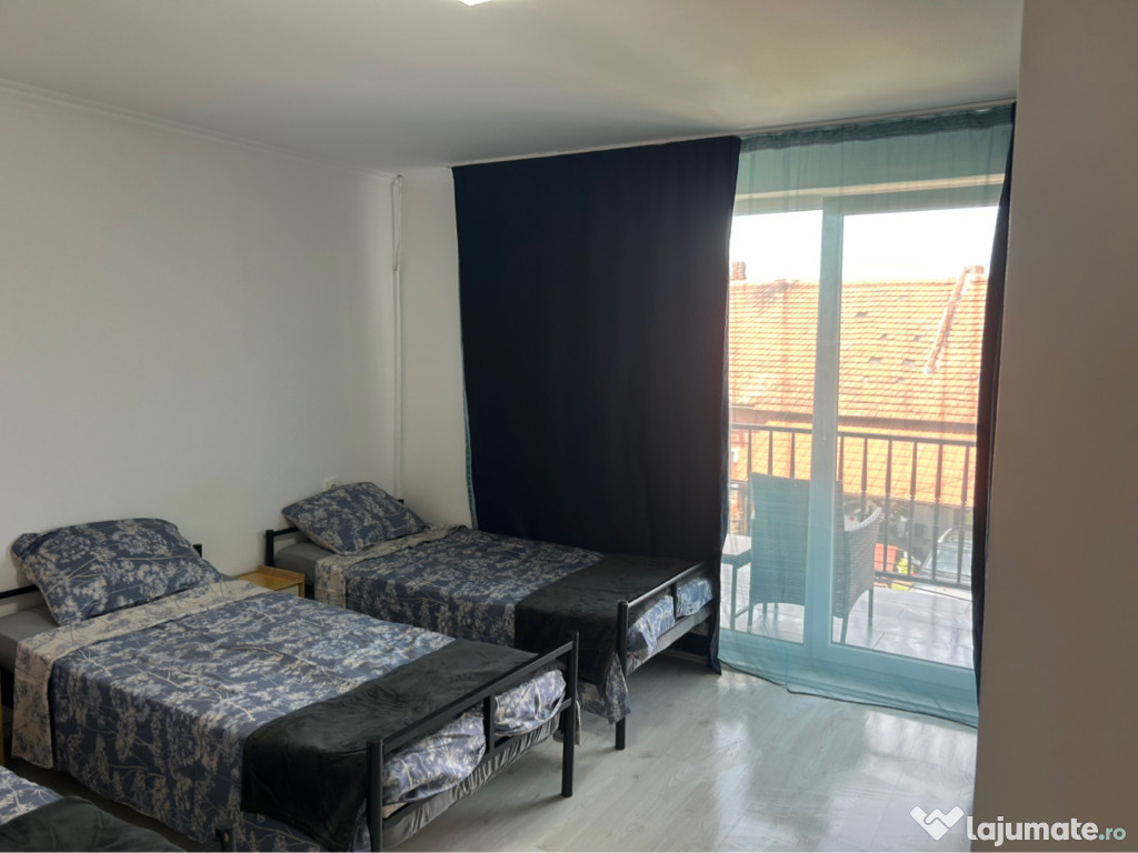 Închiriez camere în regim hotelier