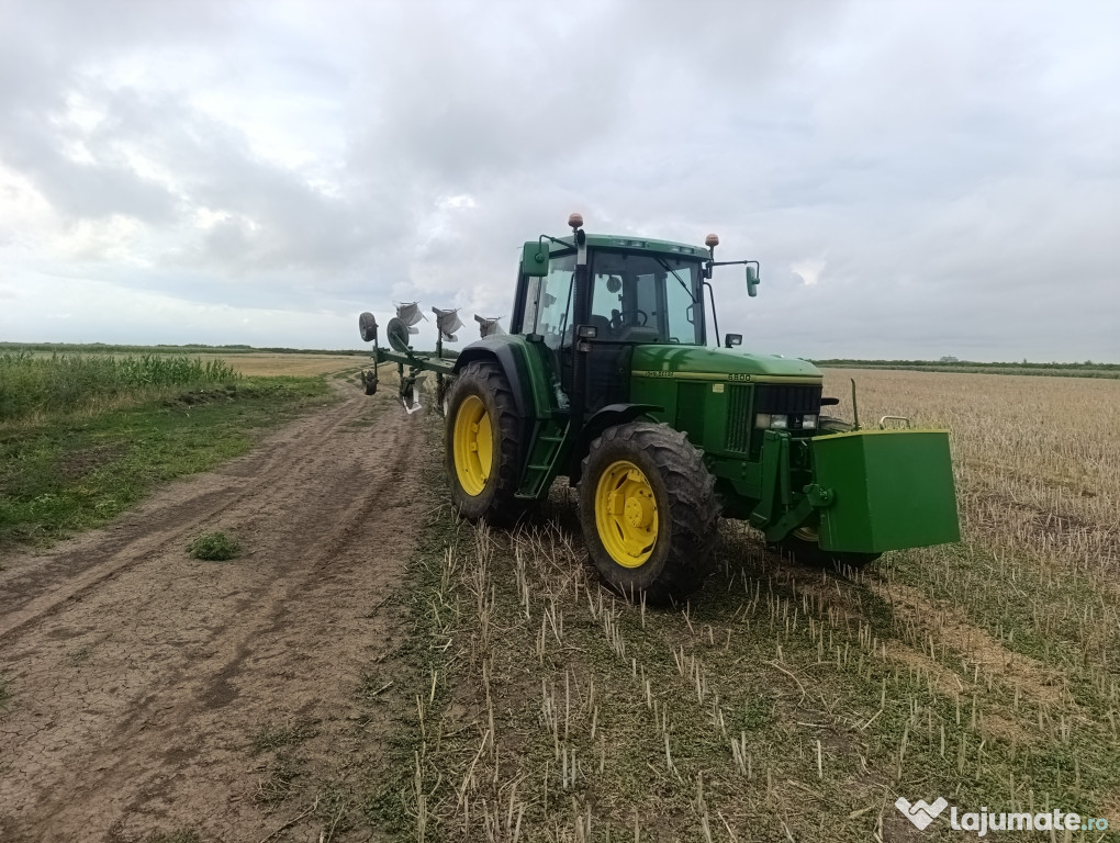 Vând John Deere 6800