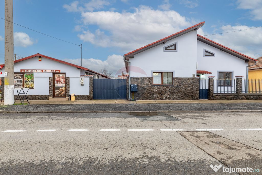 Casă spațioasă cu 4 camere și spațiu comercial în B...