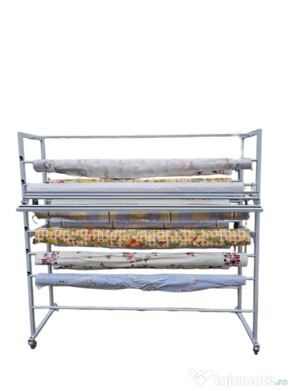 Suport pentru fata de masa cu dispozitiv de taiere