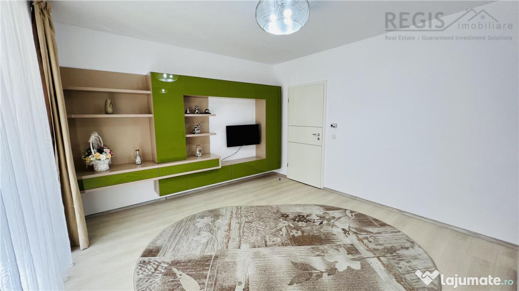 Apartament spatios de 2 camere cu gradina, parcare boxa