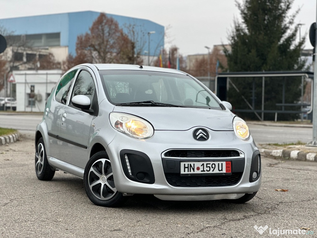 Citroen C1*lumini de zi~led*benzina*4 usi*clima*euro 5*af.2013/luna 03