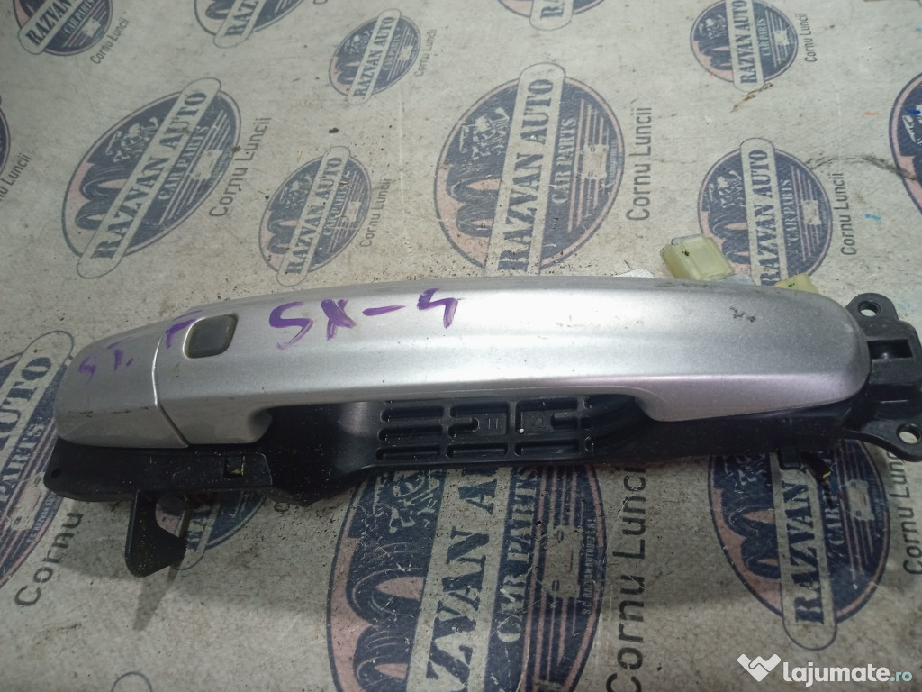 Maner exterior stanga fata Suzuki SX4 2013