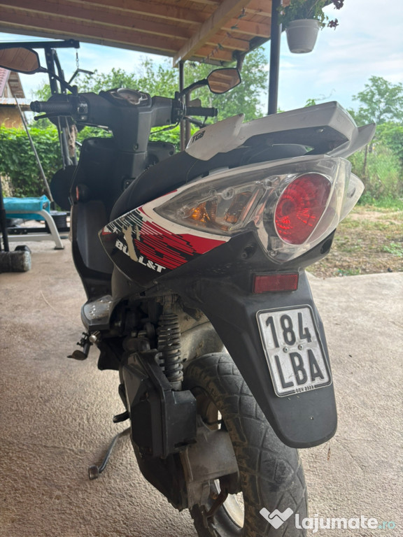 Scuter 49cc în doi timpi !