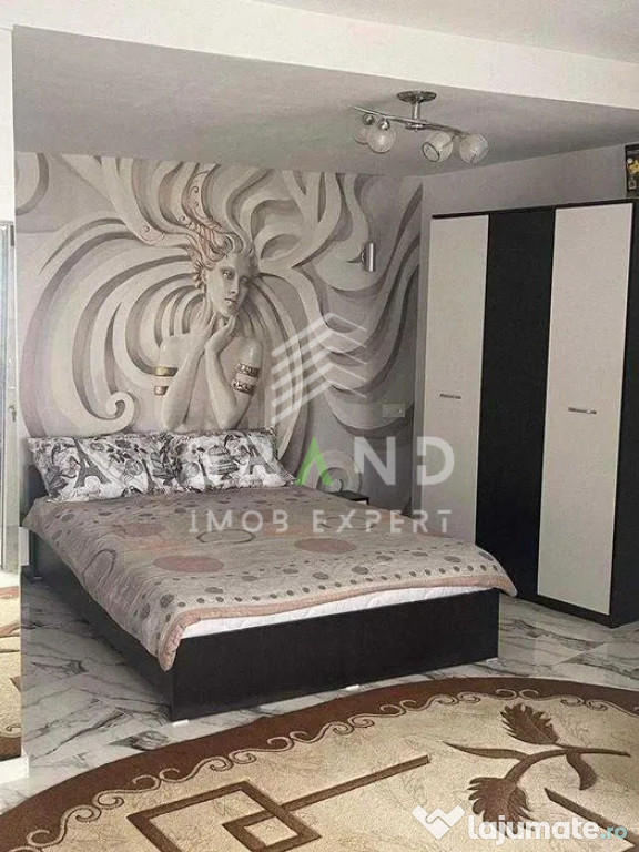 Garsonieră de închiriat, cu grădină privată, în casă,