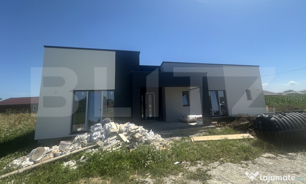 Casa plan parter,129mp utili,660mp teren,Paulesti