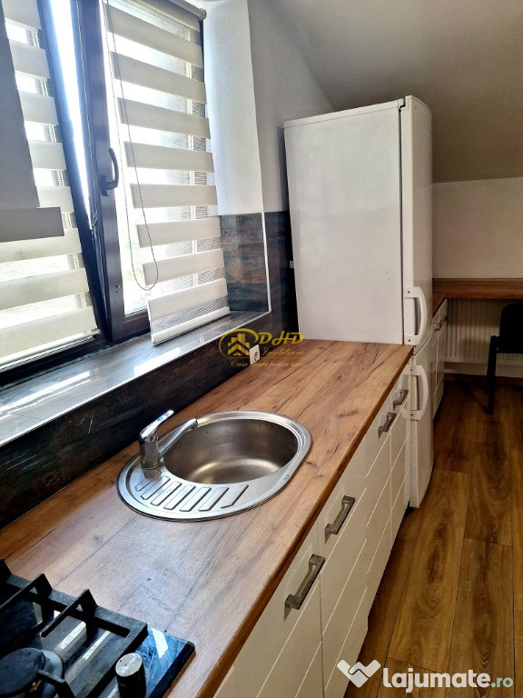 Apartament o camera