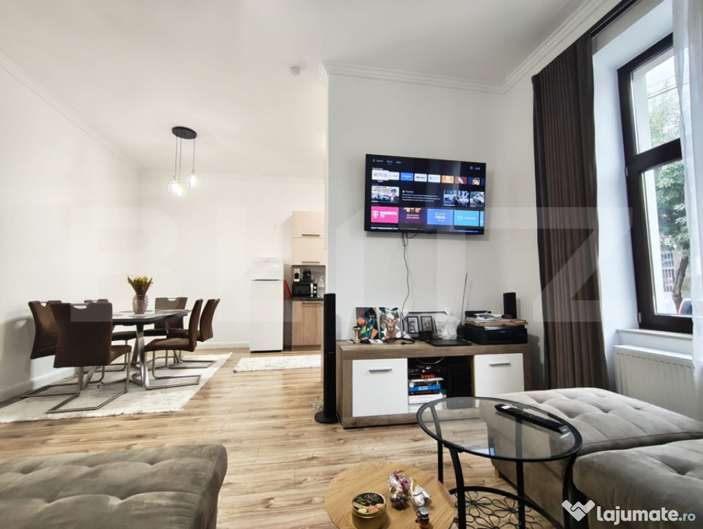 Casa la curte comuna pe 2 nivele , 3 dormitoare Central