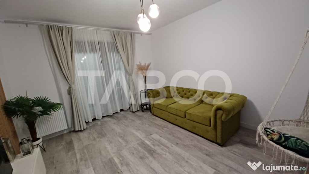 Apartament modern mobilat si utilat etaj intermediar bloc cu