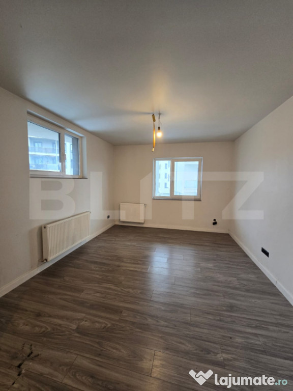 Apartament la demisol, 2 camere, 55 mp, cu parcare, zona Don