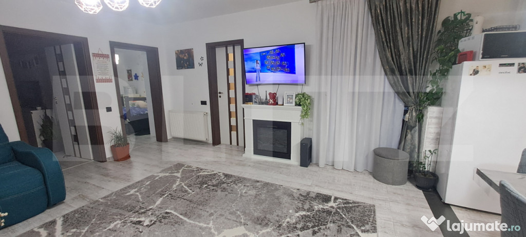 Apartament cu 3 cam,70 mp, etajul 1 ,cu parcare si 2 balcoan